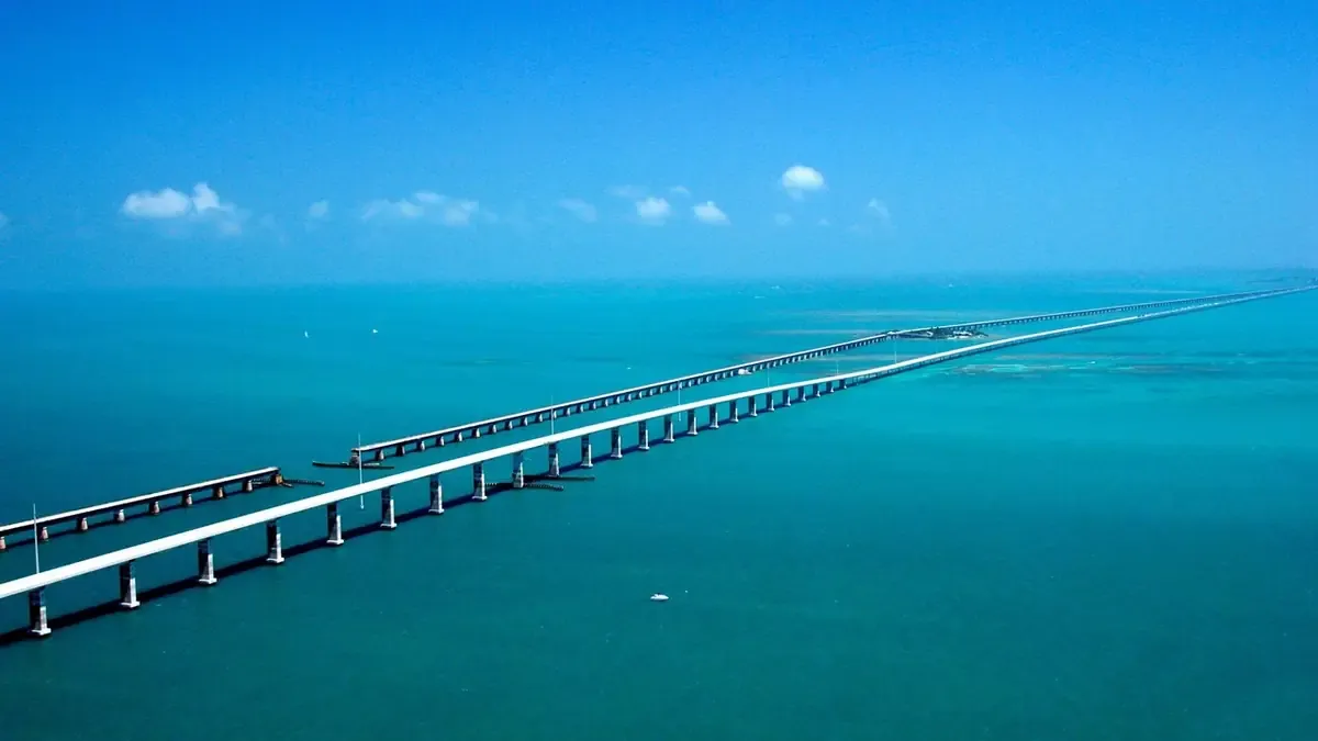 Real aerial photo of the Seven Mile Bridge in the Florida Keys over turquoise water